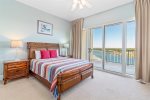 Guest Bedroom with Balcony Access and Pristine Views 
